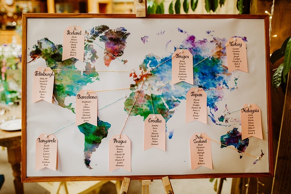 Name tables after travel destinations on a world map.