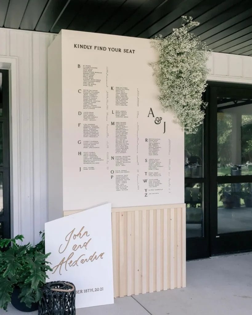 Design a full wall display with seating and decor.